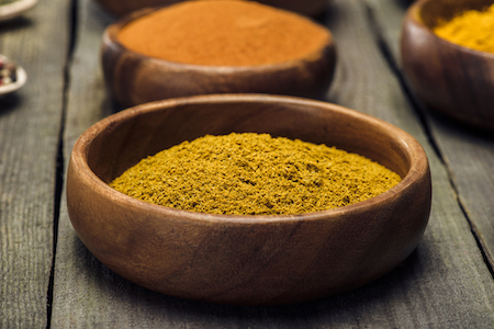 Turmeric powder in bowls.